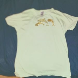 Female Jerzees shirt L in green with gold dolphins.